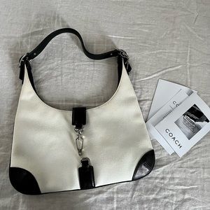 Vintage 90s black and white Coach shoulder bag.